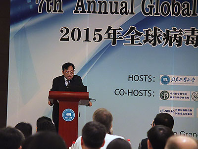 Dr. Zeng welcoming guests at 2015 symposium
